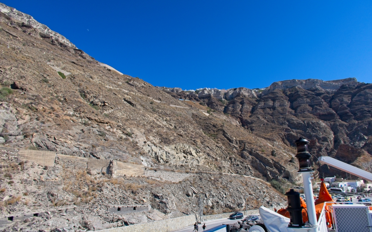 Steep road down to Athinios Port, Santorini